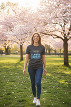 Woman walking in a park with cherry blossom trees in the background