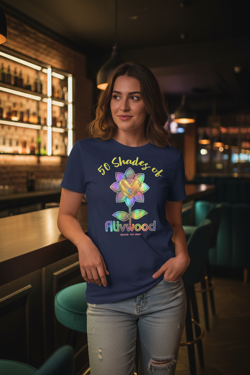Woman wearing a blue t-shirt with colorful flower design and text in a bar setting